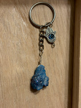 Load image into Gallery viewer, Blue Aura Quartz Crystal &amp; Hamsa Hand Charm Keychain
