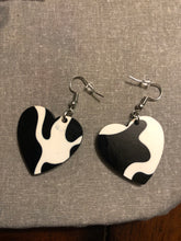 Load image into Gallery viewer, Cow Print Heart Dangle Earrings
