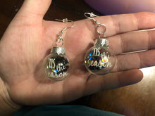 Load image into Gallery viewer, Clear/ Glittery “Tis The Season” Christmas Ornament earrings
