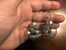 Load image into Gallery viewer, Clear/ Glittery “Tis The Season” Christmas Ornament earrings
